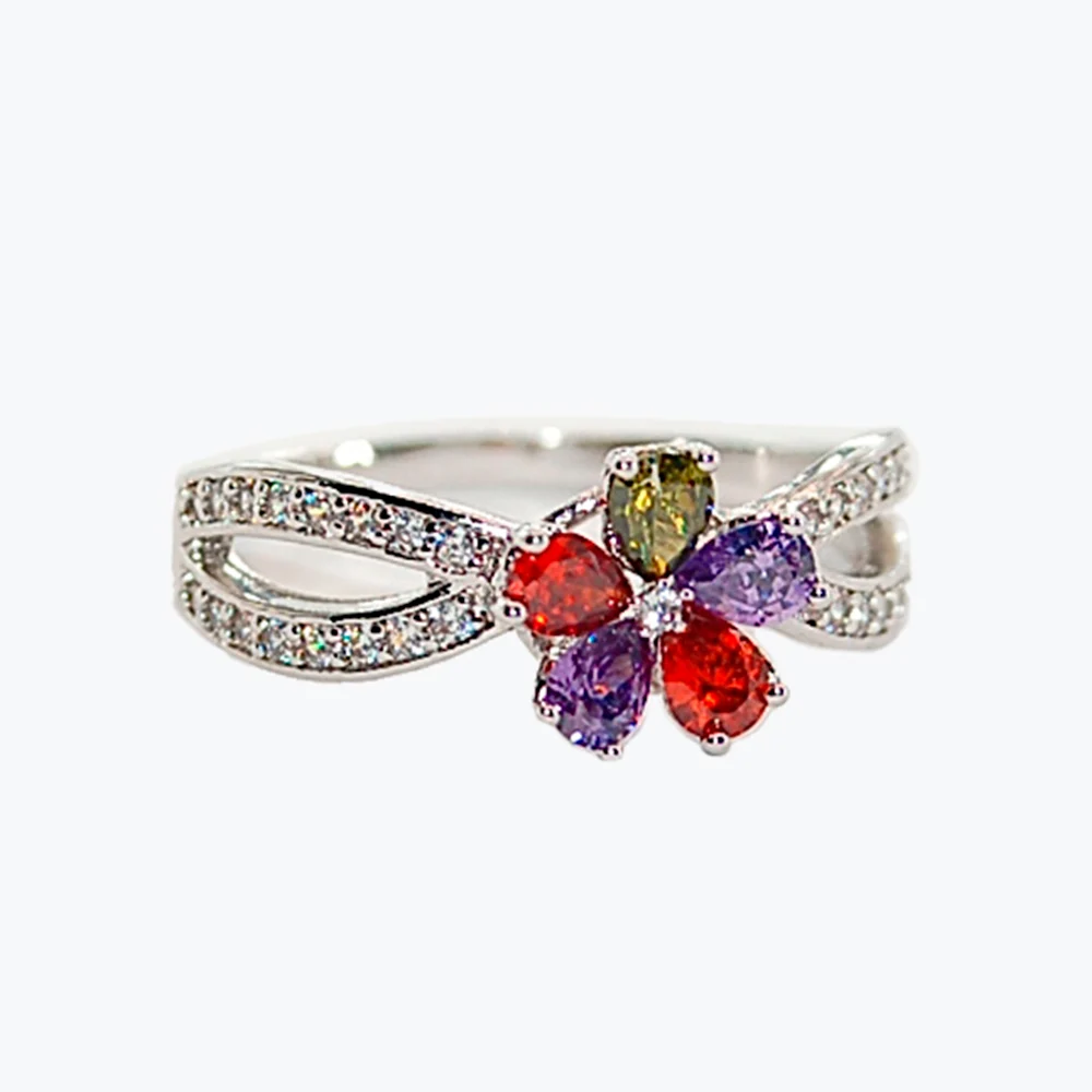 Anillo de mujer con flor de piedras de colores