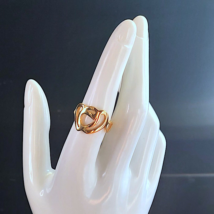 Anillo dorado mujer acero corazones entrelazados